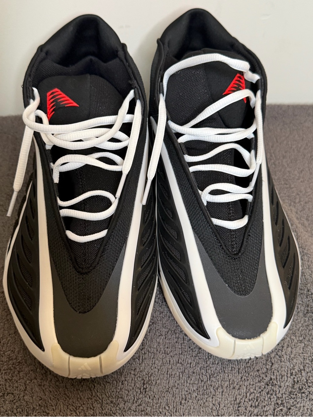 Adidas Anthony Edwards 1 Low in core black, lucid white and lucid red. Mens 11.